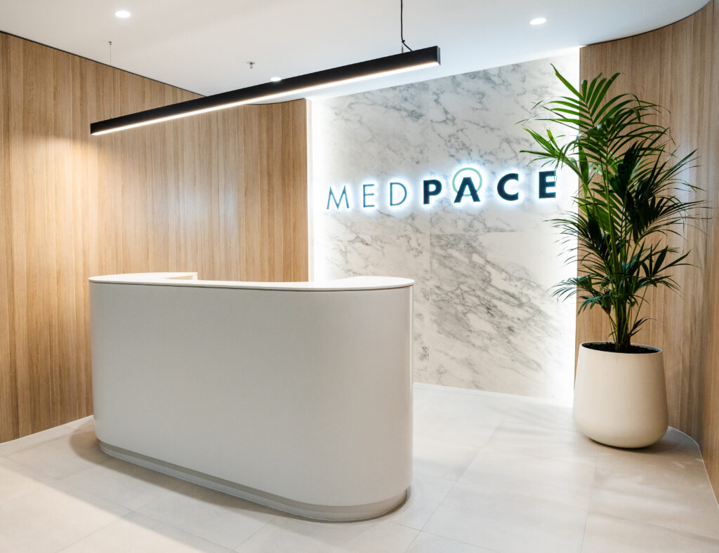 MedSpace Melbourne Reception: A well-lit, spacious office with modern design elements and a reception desk with MedSpace logo on the wall.